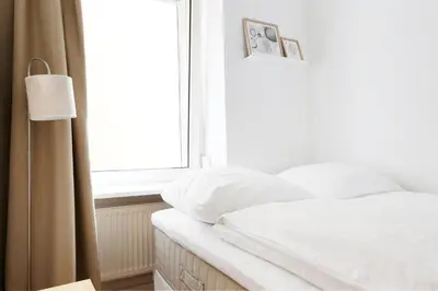Ein Bett oder Betten in einem Zimmer der Unterkunft Be in Berlin Apartments im Bergmannkiez