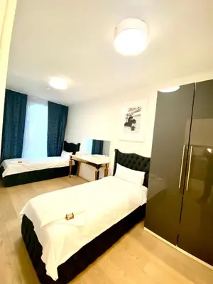 Ein Bett oder Betten in einem Zimmer der Unterkunft Nova Sky