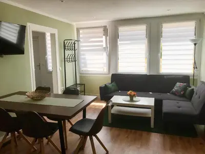 Ein Sitzbereich in der Unterkunft Moderne Ferienwohnungen mit Terrasse, Pool, Wallbox & Spielplatz in den Götzer Bergen - ideal für Ihren Berlin-Besuch und auch für Gruppen bis zu 40 Personen geeignet