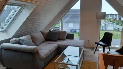 Ein Sitzbereich in der Unterkunft Ferienhaus 'Elly'