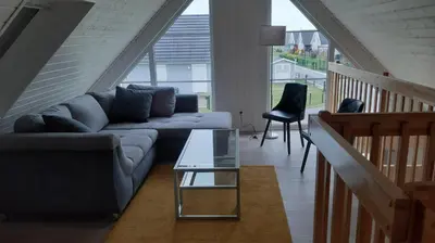 Ein Sitzbereich in der Unterkunft Ferienhaus 'Elly'