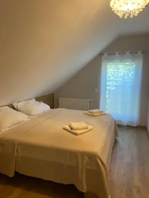 Ein Bett oder Betten in einem Zimmer der Unterkunft Gästesuite „Torfstich“
