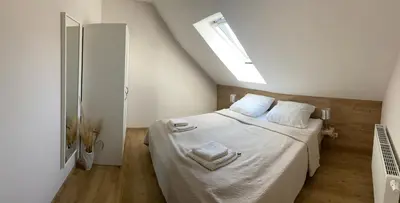 Ein Bett oder Betten in einem Zimmer der Unterkunft Gästesuite „Torfstich“
