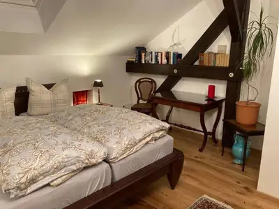 Ein Bett oder Betten in einem Zimmer der Unterkunft Dorfstübchen