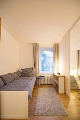 Ein Sitzbereich in der Unterkunft Ground Floor in Villa in Charlottenburg Garden View
