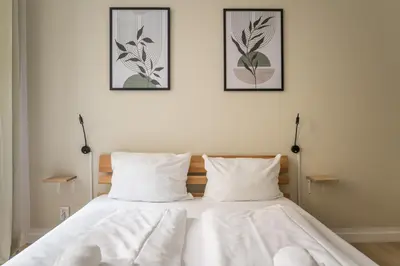 Ein Bett oder Betten in einem Zimmer der Unterkunft Spacious Family Apartment with 2 Bedrooms