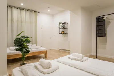 Ein Bett oder Betten in einem Zimmer der Unterkunft Spacious Family Apartment with 2 Bedrooms