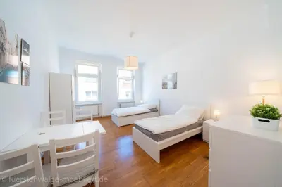 Ein Bett oder Betten in einem Zimmer der Unterkunft Apt Watt 2 Zimmer 55qm TV Waschmaschine Trockner Vollausstattung zentral