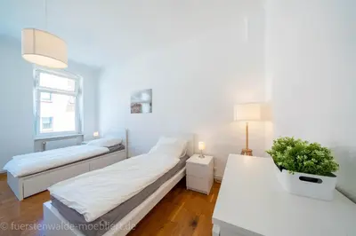Ein Bett oder Betten in einem Zimmer der Unterkunft Apt Watt 2 Zimmer 55qm TV Waschmaschine Trockner Vollausstattung zentral