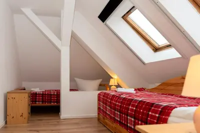 Ein Bett oder Betten in einem Zimmer der Unterkunft ROSEWOOD by Comfort Housing - 2 bedroom apartment