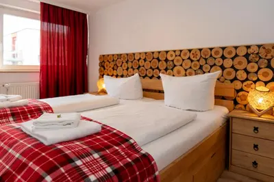 Ein Bett oder Betten in einem Zimmer der Unterkunft ROSEWOOD by Comfort Housing - 2 bedroom apartment