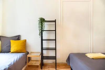 Ein Bett oder Betten in einem Zimmer der Unterkunft Spacious Family Apartment at Mauerpark plus SelfCheckIn