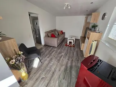 Ein Sitzbereich in der Unterkunft Ferienhaus Muellrose am Wald