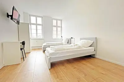 Ein Bett oder Betten in einem Zimmer der Unterkunft Chic Apartment in Jüterbog
