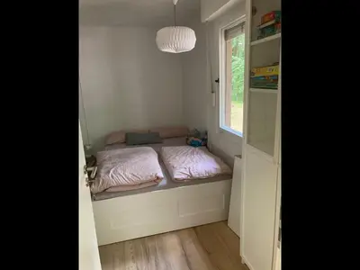 Ein Bett oder Betten in einem Zimmer der Unterkunft NEU! Schöner Bungalow am Zenssee