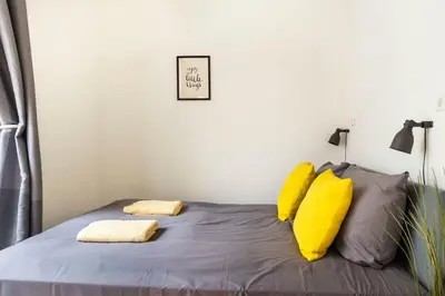 Ein Bett oder Betten in einem Zimmer der Unterkunft FAMILY at Mauerpark plus SelfCheckIn plus Street Parking