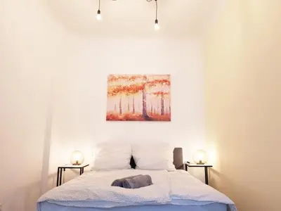 Ein Bett oder Betten in einem Zimmer der Unterkunft Family Apartment Moabit