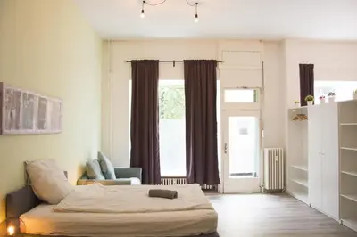 Ein Bett oder Betten in einem Zimmer der Unterkunft Family Apartment Moabit