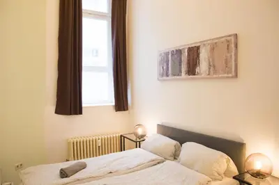 Ein Bett oder Betten in einem Zimmer der Unterkunft Family Apartment Moabit
