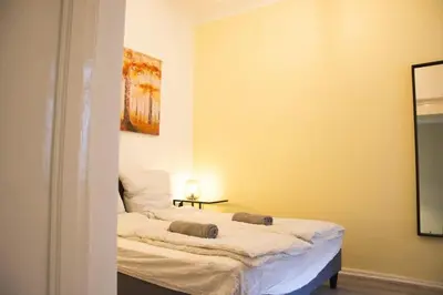 Ein Bett oder Betten in einem Zimmer der Unterkunft Family Apartment Moabit