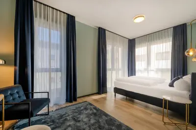 Ein Bett oder Betten in einem Zimmer der Unterkunft The Base Berlin ONE