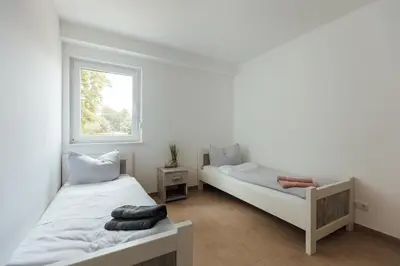 Ein Bett oder Betten in einem Zimmer der Unterkunft Exklusive Ferienwohnungen an der Havel