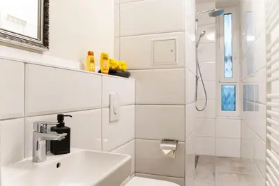 Ein Badezimmer in der Unterkunft Loft Apart plus AC plus SelfCheckIn