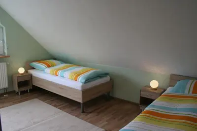 Ein Bett oder Betten in einem Zimmer der Unterkunft Ferienhaus Helbig Buckow