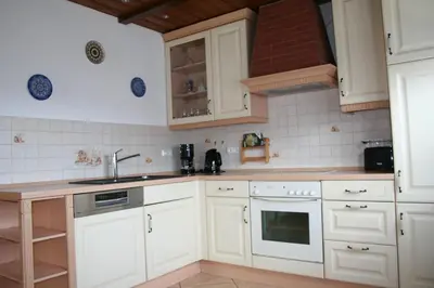 Küche/Küchenzeile in der Unterkunft Ferienhaus Helbig Buckow