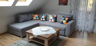 Ein Sitzbereich in der Unterkunft Ferienhaus Helbig Buckow
