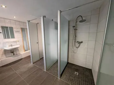 Ein Badezimmer in der Unterkunft Jeamais Pension