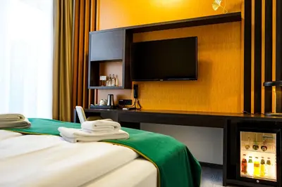 Ein Bett oder Betten in einem Zimmer der Unterkunft M-Pire Hotel Berlin