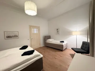 Ein Bett oder Betten in einem Zimmer der Unterkunft Be in Berlin Apartments at Charlottenburg Castle