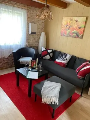 Ein Sitzbereich in der Unterkunft Ferienwohnung Irmchen