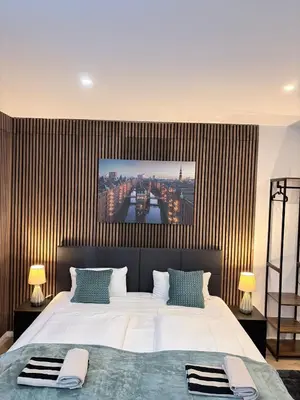 Ein Bett oder Betten in einem Zimmer der Unterkunft BIG 7RMS City Central Loft, 1ALocation