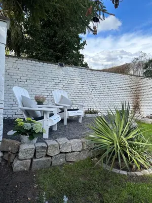 Ein Garten an der Unterkunft Remise-Berlin-Grünau your cozy and comfortable home to stay for up to 6 people between Müggelsee and Berlin city