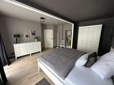 Ein Bett oder Betten in einem Zimmer der Unterkunft Remise-Berlin-Grünau your cozy and comfortable home to stay for up to 6 people between Müggelsee and Berlin city