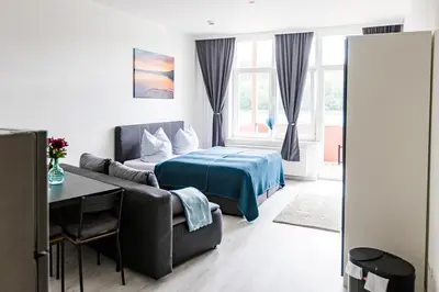 Ein Bett oder Betten in einem Zimmer der Unterkunft Ferienwohnungen direkt am Werbellinsee
