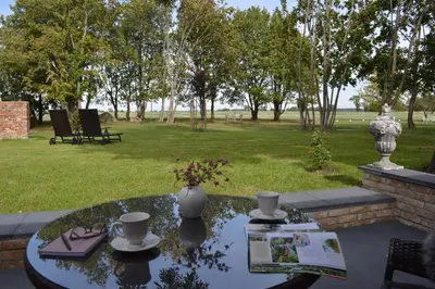 Ein Garten an der Unterkunft Gästehaus Landglück