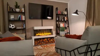 TV/Unterhaltungsangebot in der Unterkunft Penthouse in Villa am Wasser + Parken + WLAN + Netflix +Kamin