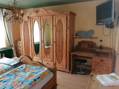 Ein Bett oder Betten in einem Zimmer der Unterkunft Ferienwohnung Hella