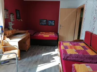 Ein Bett oder Betten in einem Zimmer der Unterkunft Ferienwohnung Hella