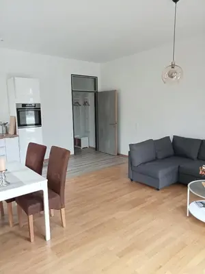 Ein Sitzbereich in der Unterkunft Stadtgrün 2, Ruhiges Apartment mit Terrasse und kostenlosem Parkplatz, ideal für Berlin-Besucher