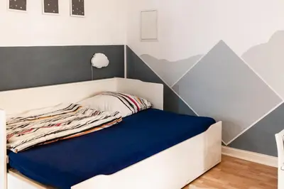 Ein Bett oder Betten in einem Zimmer der Unterkunft Family-friendly apartment in the center of Berlin