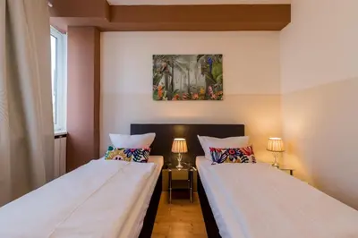 Ein Bett oder Betten in einem Zimmer der Unterkunft BIG Fancy Apartments City Center