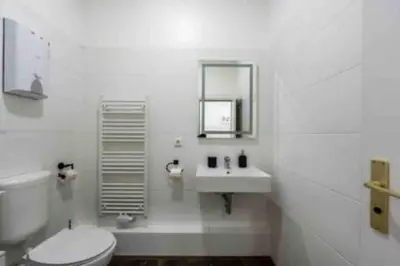 Ein Badezimmer in der Unterkunft BIG Fancy Apartments City Center