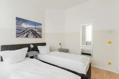 Ein Bett oder Betten in einem Zimmer der Unterkunft BIG Fancy Apartments City Center