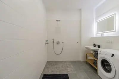 Ein Badezimmer in der Unterkunft BIG Fancy Apartments City Center