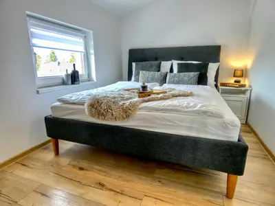 Ein Bett oder Betten in einem Zimmer der Unterkunft Altes Fischerhaus am Grimnitzsee