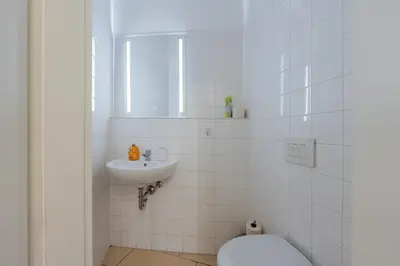 Ein Badezimmer in der Unterkunft Grand Central City Apartments Mitte Rosenthaler Platz
